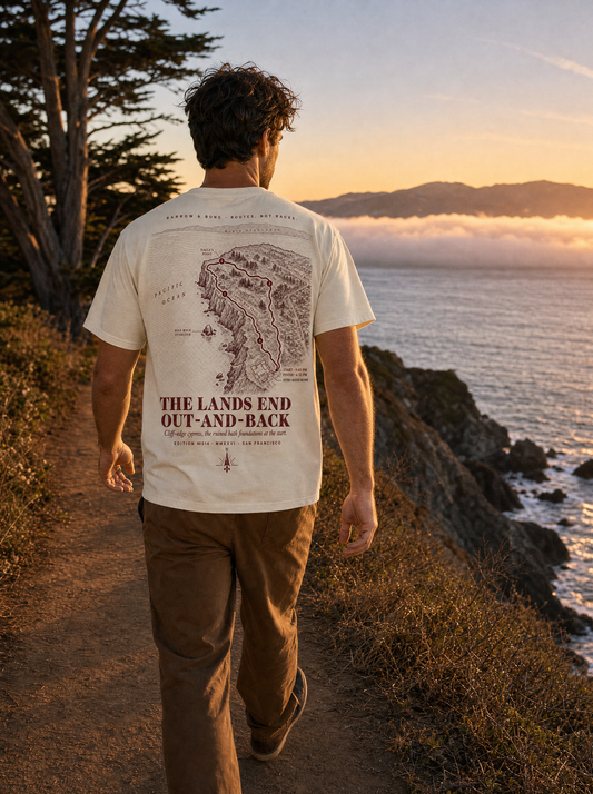 The Lands End — model on Lands End Trail with Marin headlands at sunset